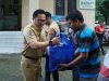 Kolaborasi PGRI dan Baznas Gowa: Wabup Serahkan Paket Sembako ke Guru Honorer